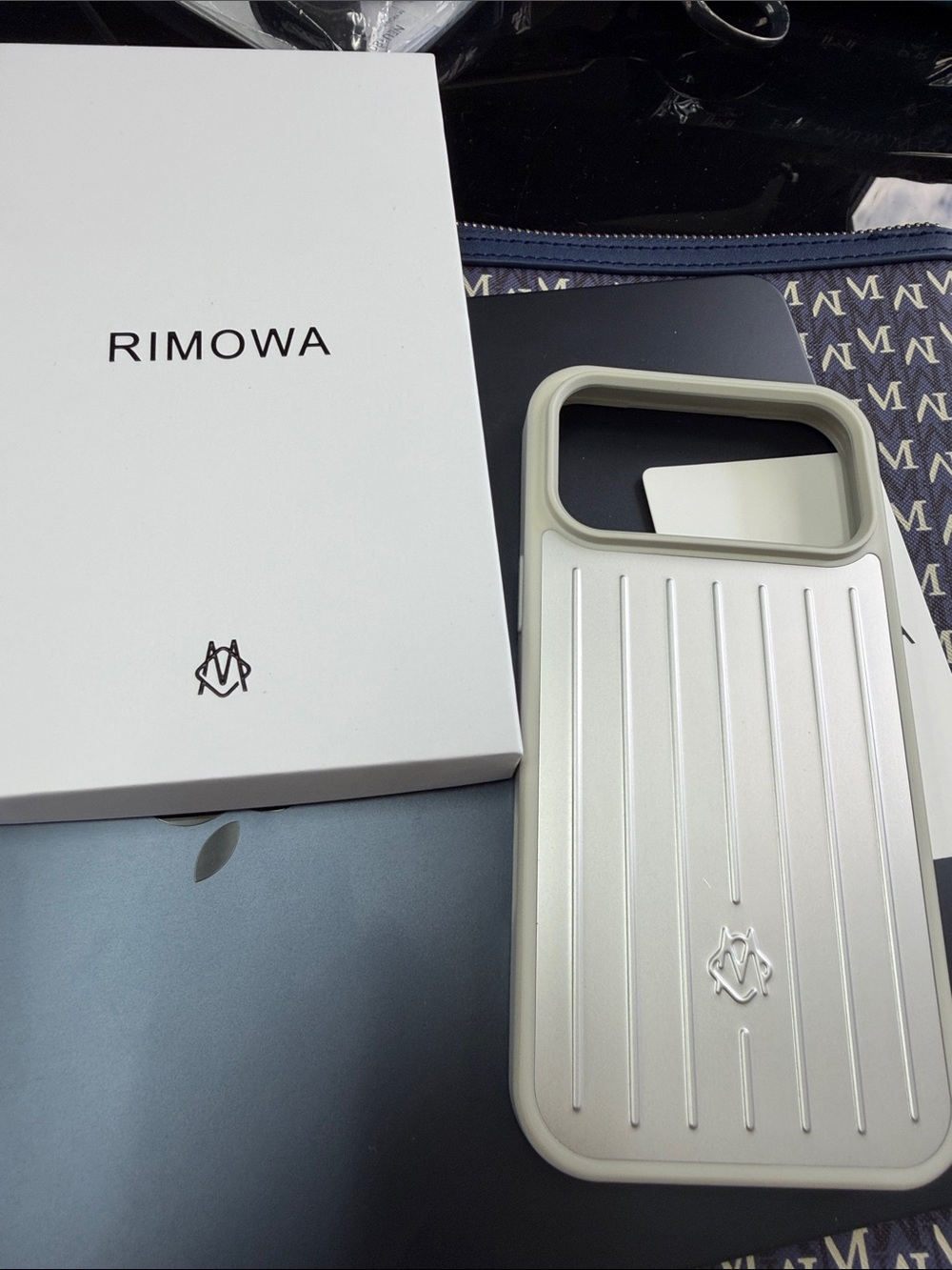 RIMOWA Silver Ribbed Phone Case with Logo - case for iPhone 17 Pro Max